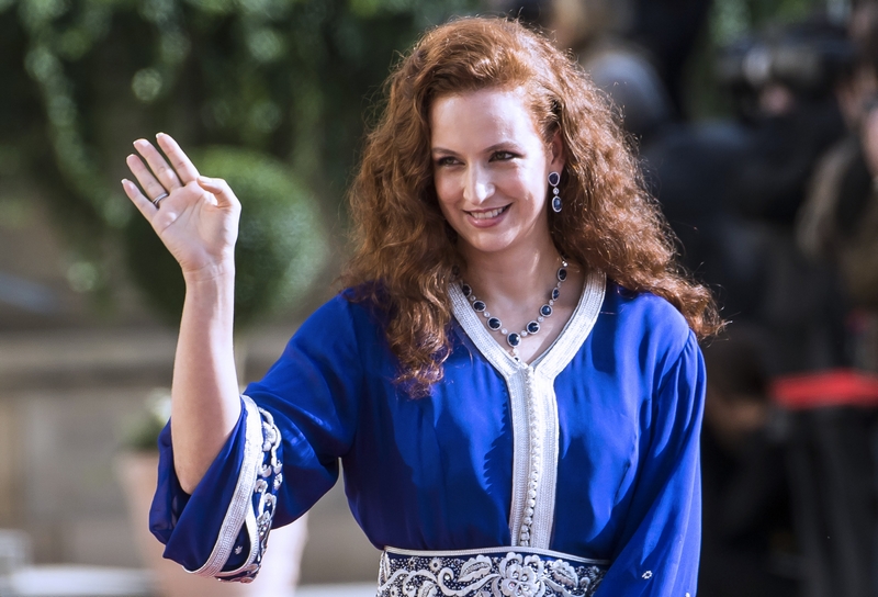 Princess Lalla Salma of Morocco waves as she leaves the Notre-Dame cathedral of Luxembourg after the religious marriage of Crown Prince Guillaume of Luxembourg and Belgian countess Stephanie de Lannoy, on October 20, 2012, in Luxembourg. Crowned heads of Europe and ordinary citizens gathered for Luxembourg's biggest royal event in decades to see heir-to-the-throne Prince Guillaume wed Belgian countess Stephanie de Lannoy. AFP PHOTO/BELGA/NICOLAS LAMBERT -BELGIUM OUT-